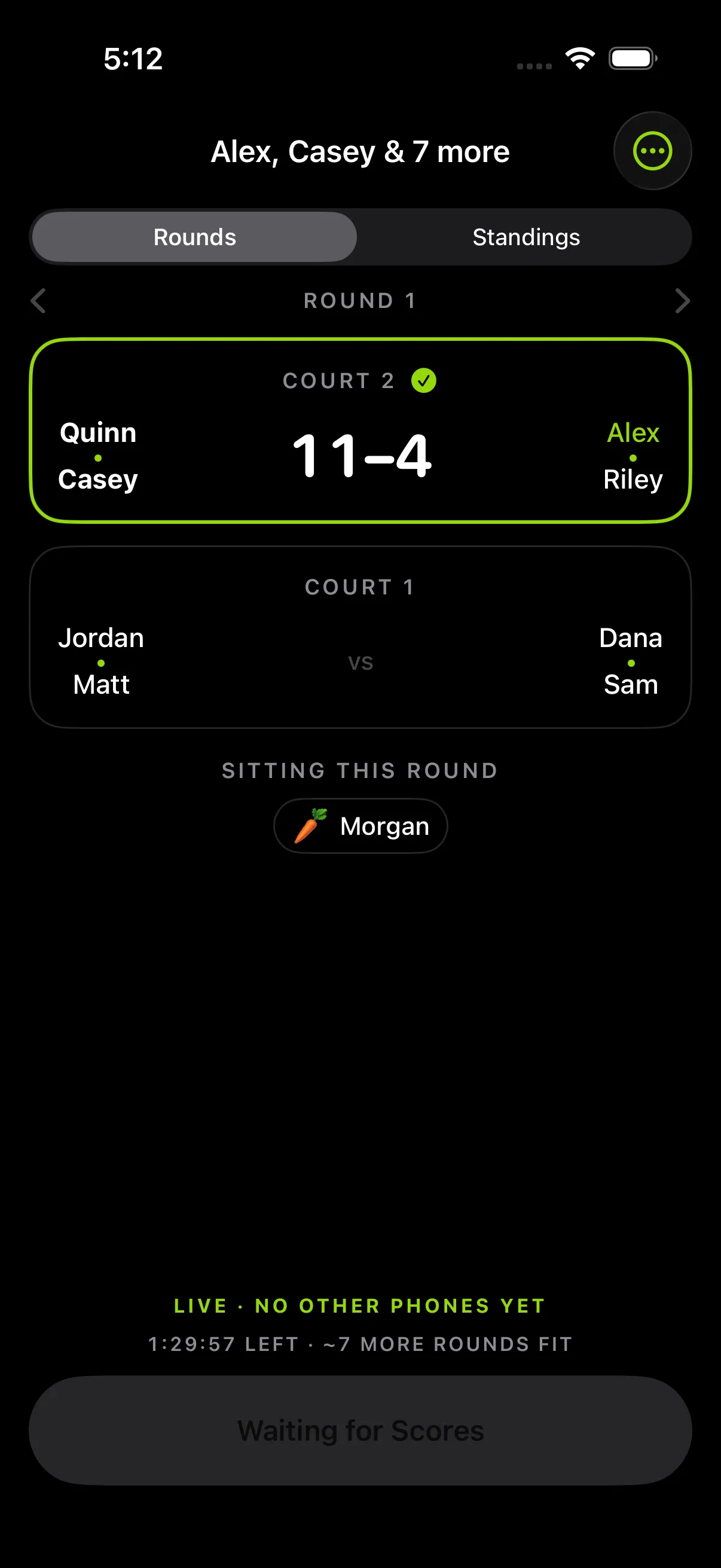 Win by Two on an iPhone: round 1 on two courts, with Court 2 scored 11–4 and one player sitting the round out